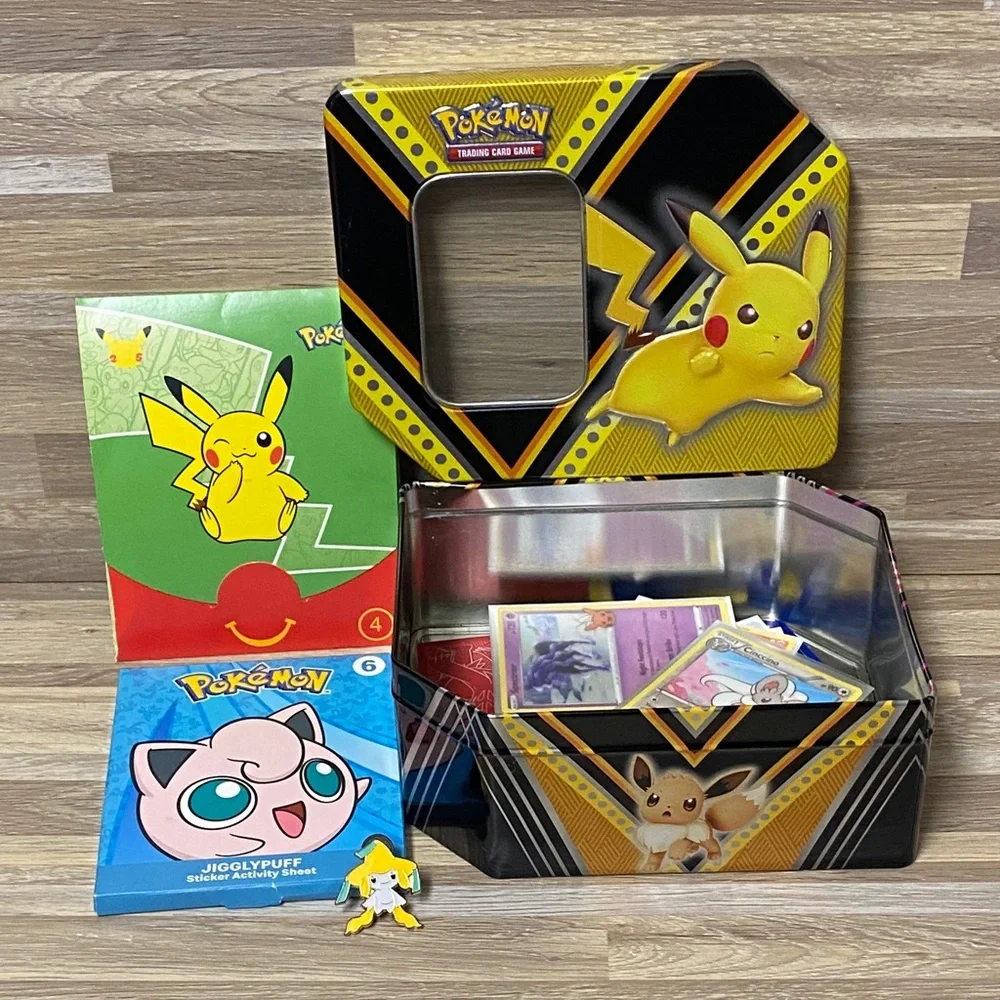 Pokemon Pikachu Yellow and Black Card Tin filled with cards and Pokémon pin